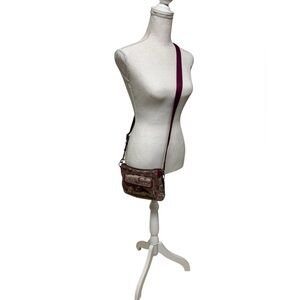 Coach Crossbody bag. Purple and tans.